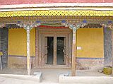 Tibet Guge 07 Tsaparang Red Temple 01 Outside Tsaparangs Red Temple (Lhakhang Marpo) was built around 1470, perhaps 30 years earlier than the White Temple. The murals in this 16m x 20m chapel were repainted around 1630, shortly before the fall of the Guge kingdom. The main statue of Shakyamuni was built of gilded bronze, but alas lays in rubble, destroyed by the Chinese Red Guards.